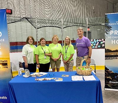 group at indoor booth