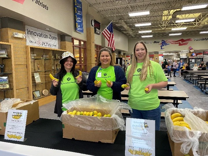 volunteers in vegetable costumes