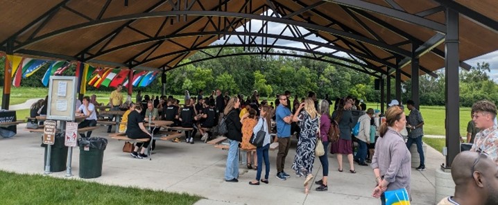 group of people under canopy