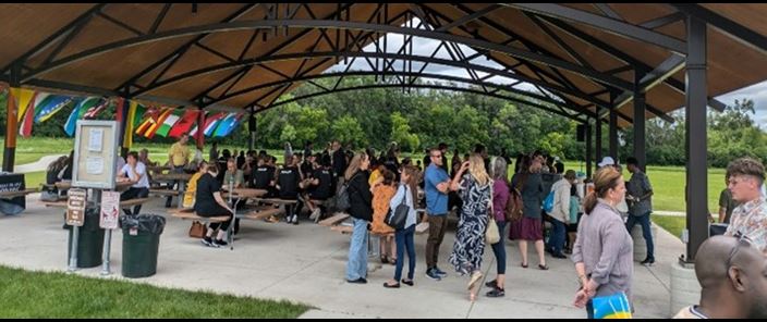 group of people under canopy