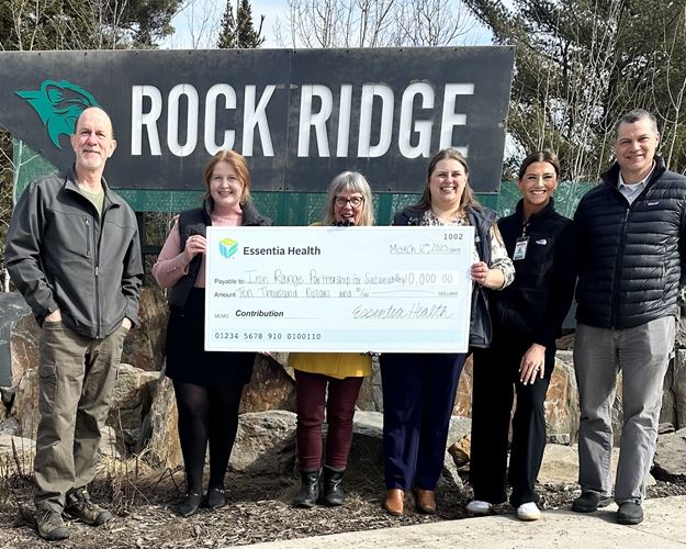A group with a large check